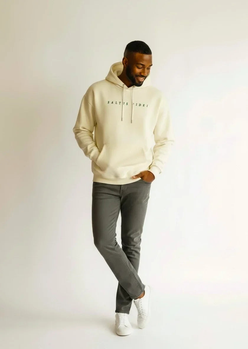 Model wearing the off-white Saltus Fidei hoodie, full-length studio shot