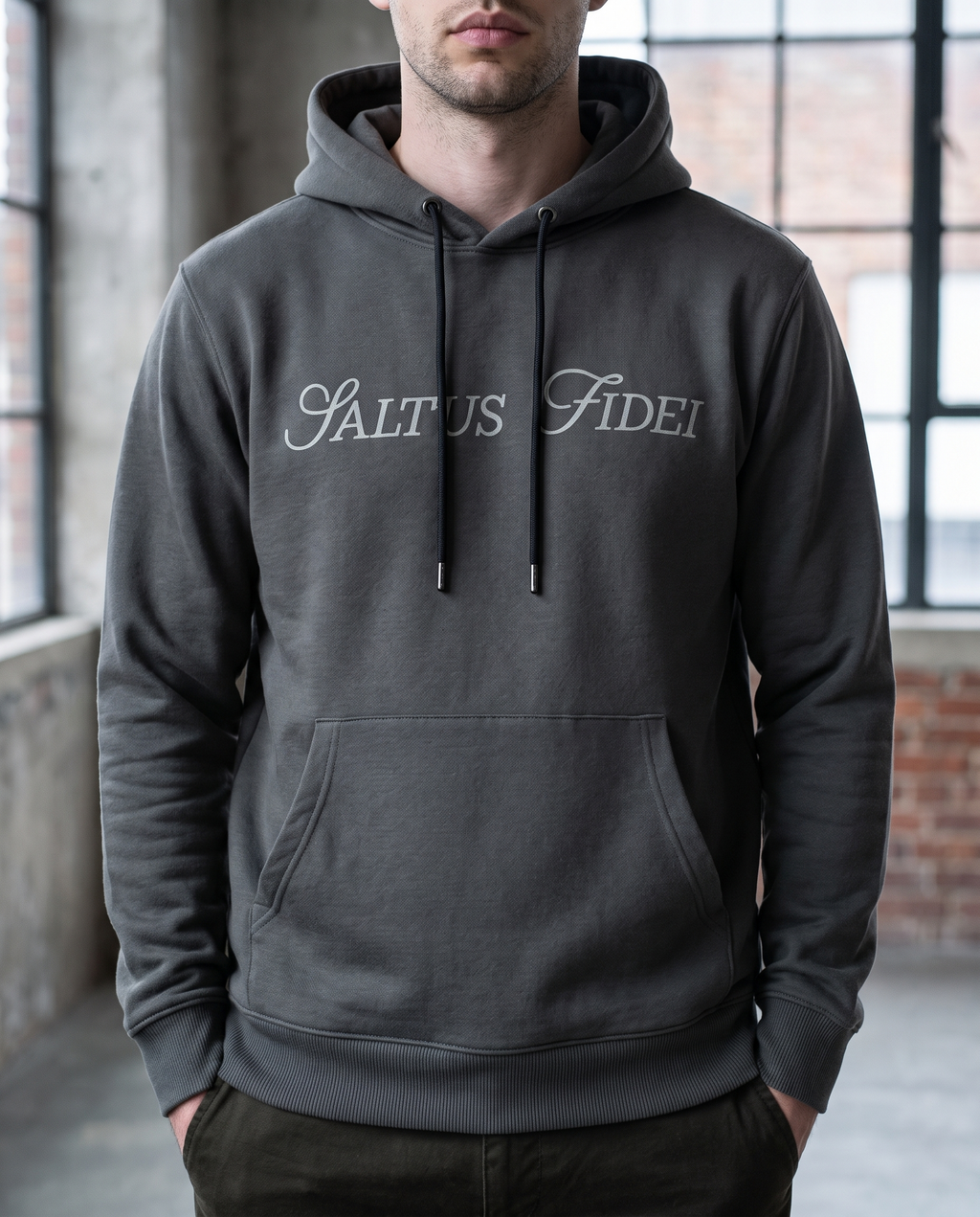 Charcoal grey Saltus Fidei hoodie worn by a model, alternate studio angle
